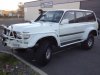 HDJ80 w/ Arctic Flares ARB Bumper Side Steps Aero Hood